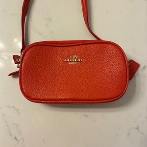 Authentic Coach crossbody wallet in sun orange